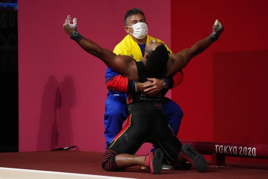 APTOPIX Tokyo Olympics Weightlifting Men